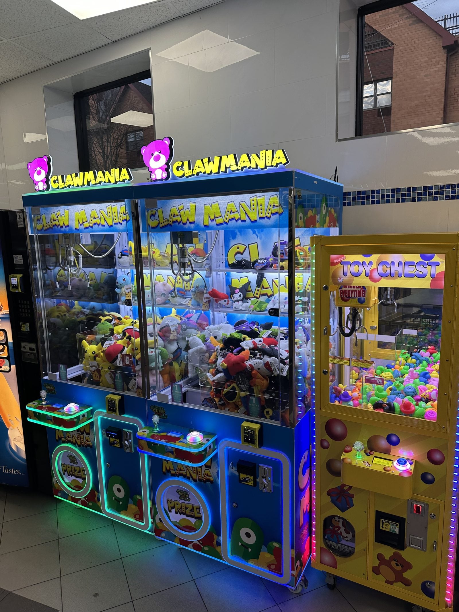 Claw machines placed by The Arcade Pros in a laundromat