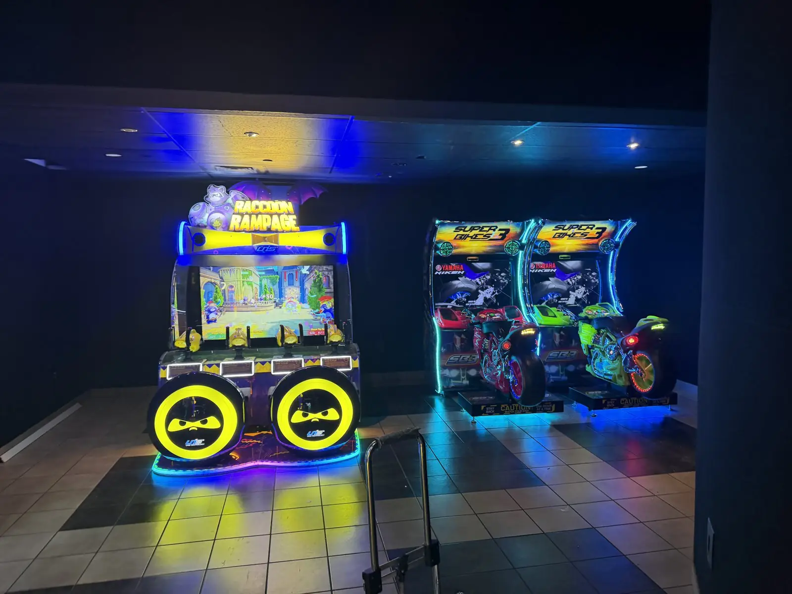 Racing video games installed by The Arcade Pros in a Regal theater game room