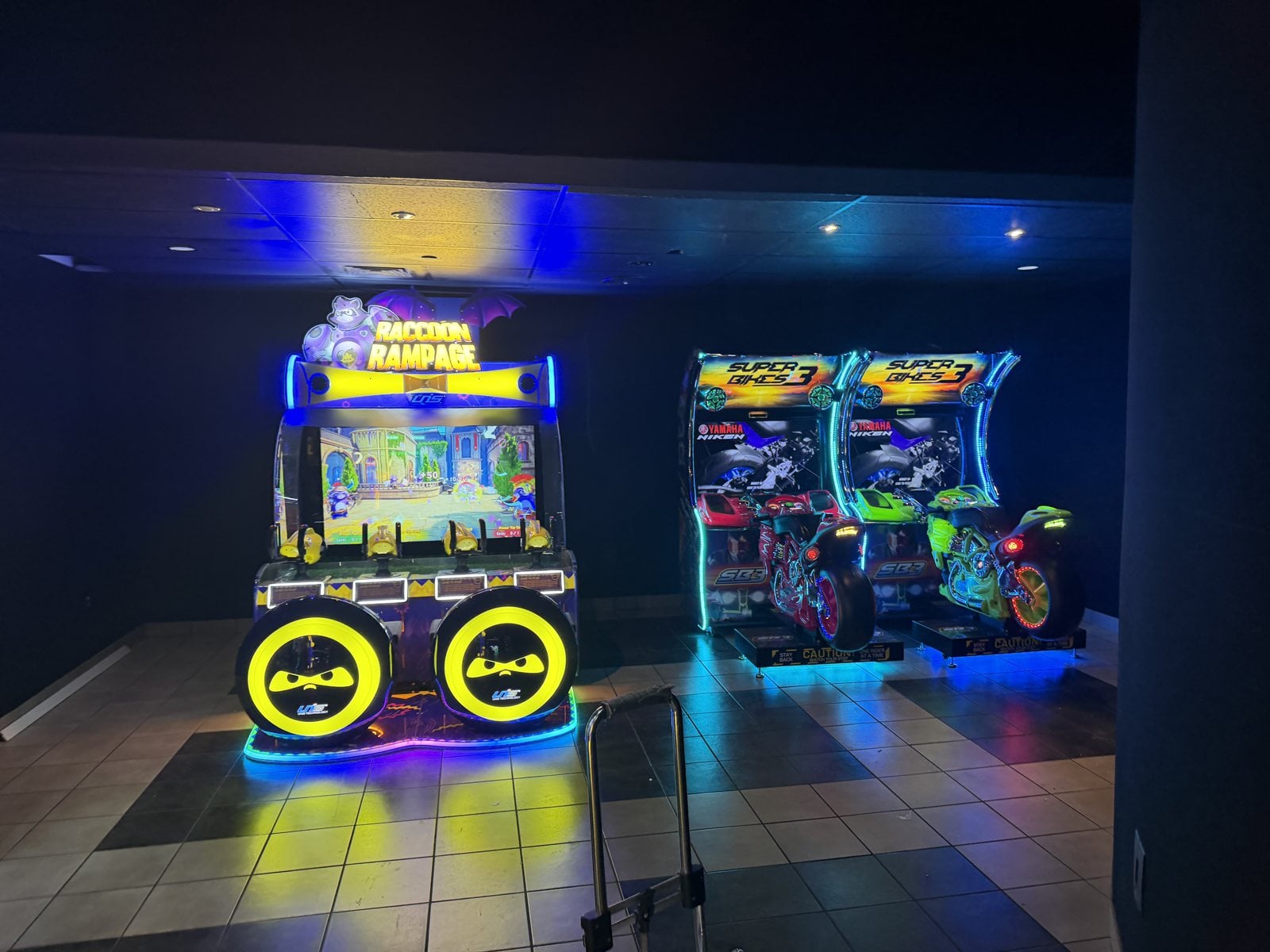 Racing video games installed by The Arcade Pros in a Regal theater game room