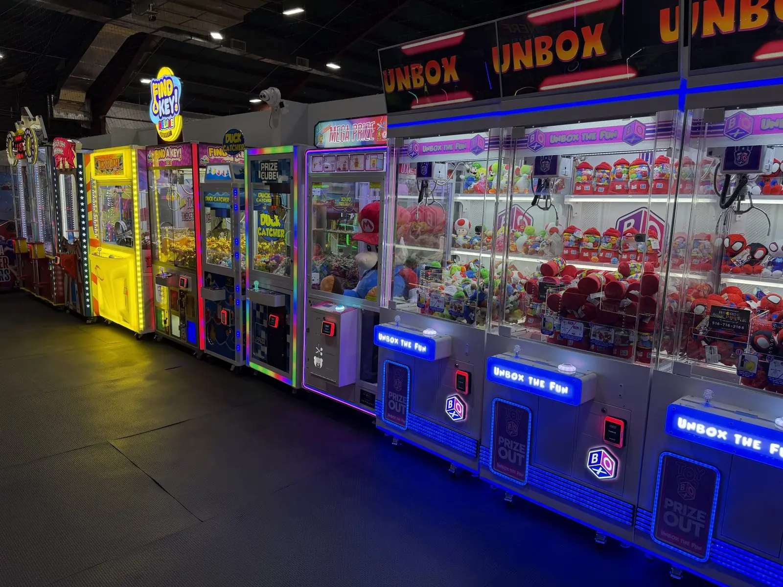 Wide view of the claw machine row The Arcade Pros placed at a Sky Zone trampoline park
