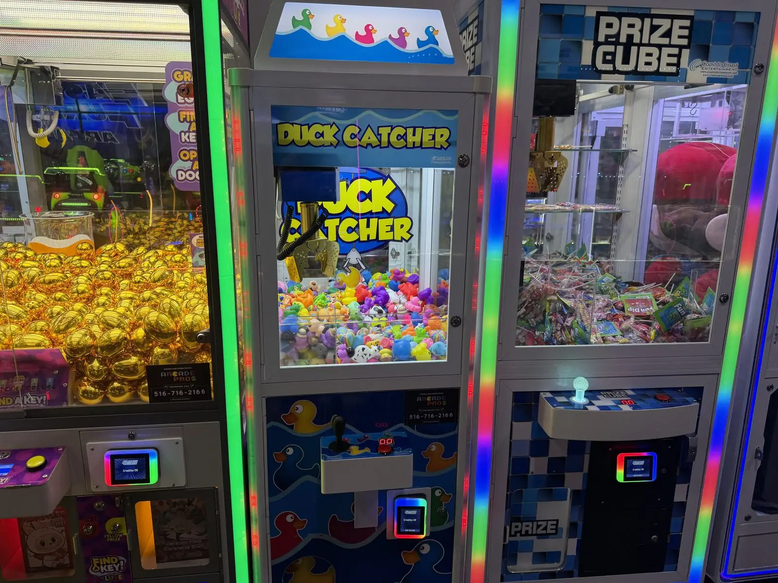 Duck Catcher and Prize Cube claw machines at a Sky Zone trampoline park, placed by The Arcade Pros